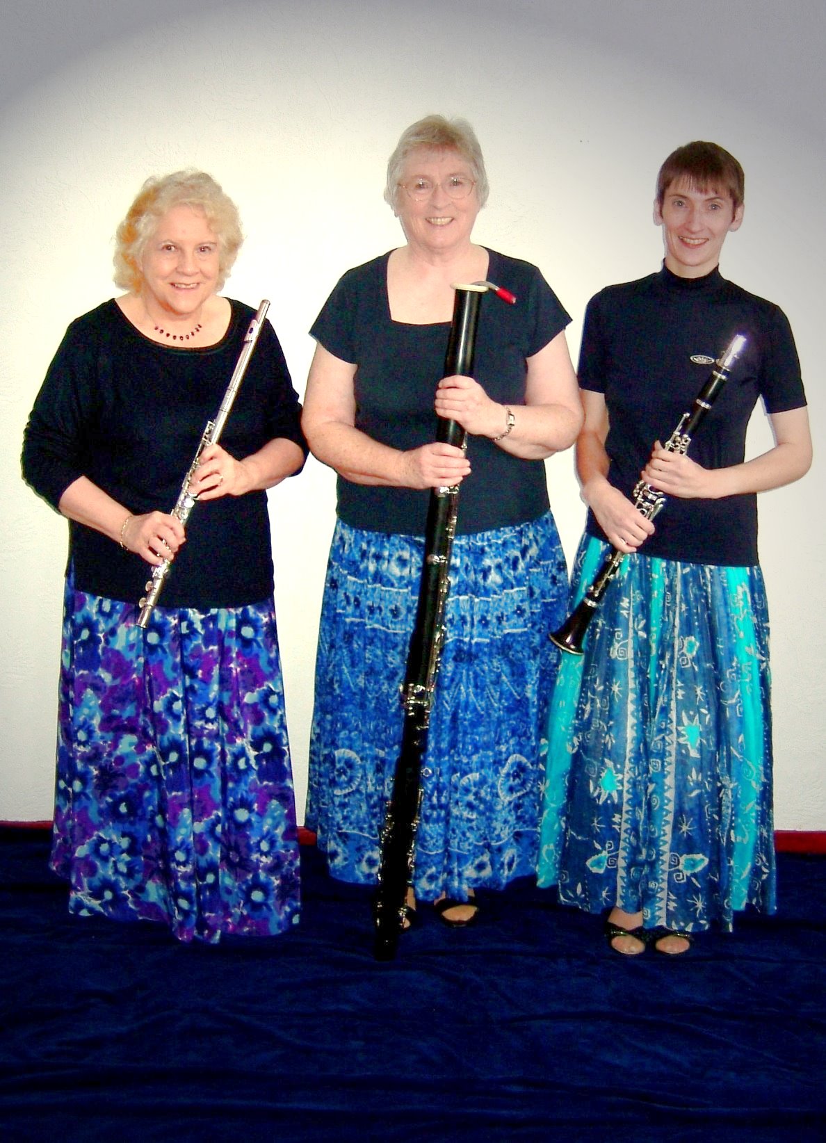 Trio in long blue skirts